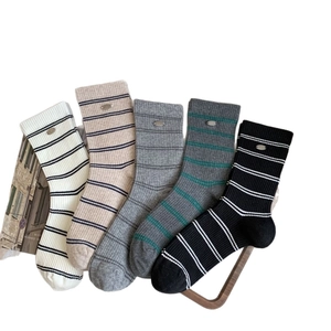 Five-pair set of ribbed cotton mid-calf socks with metal buckle and stripe details