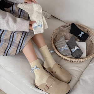 Women's autumn cotton socks featuring cute blue bow accents and lace trim decorations