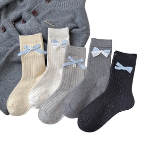 Five pairs of Korean style crew socks with ribbon bows and colorful confetti yarn texture
