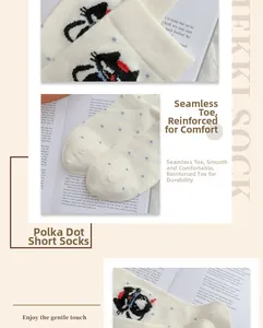Detail of white cotton socks with blue polka dots featuring reinforced toe and flat seams