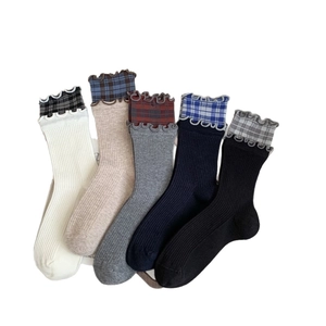 Set of 5 cotton crew socks for women featuring ruffle cuffs and classic plaid patterns