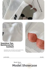 Detail of seamless toe and reinforced stitching on beige cotton crew socks