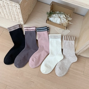 Five pairs of Japanese-style striped ribbed crew socks in assorted autumn cotton colors