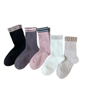 Five-pack set of minimalist striped crew socks in black, grey, white, and pink tones