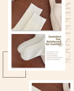 Detail of white rib-knit socks featuring seamless toe and reinforced footbed design