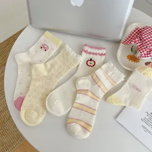 Detail of 5-pack cute mesh crew socks with fruit embroidery and sweet ruffle cuffs