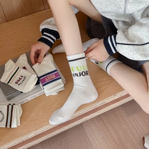 Women's trendy mid-calf cotton sports socks with colorful stripes and graphic lettering