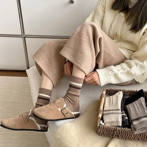 Detailed knit texture of wool crew socks for women in various seasonal colors