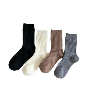 Men's solid color ribbed mid-calf warm socks in black, beige, coffee, and grey