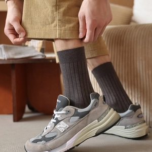 Men's thick cashmere blend ribbed socks in dark brown styled with casual sneakers