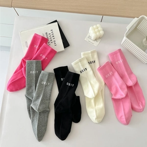 Colorful cotton sports socks with DO IT embroidery in pink, grey, black and cream