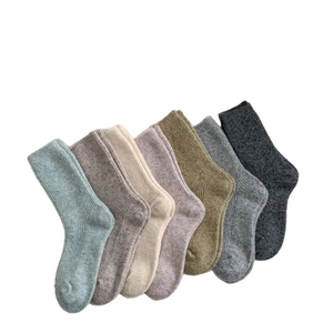 7 pairs of vintage thermal wool socks for women in various soft autumn colors