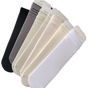 Set of six colorful combed cotton ribbed crew socks for women in neutral tones