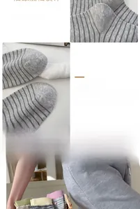 Detailed macro view of gray striped leggings showing interior flatlock stitching and seamless design