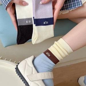 Set of colorful cotton crew socks with allo embroidery in Japanese minimalist style