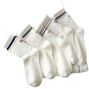 Five pairs of white cotton crew socks with colorful striped cuffs and letter embroidery