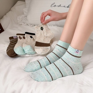 Set of women's combed cotton ankle socks with cute cat and stripe patterns in pastel colors