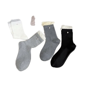 Women's chic slouch socks with elegant lace trim and pearl accents in four neutral colors