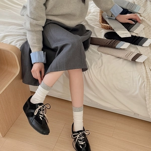 Japanese style ribbed mid-calf socks for women featuring colorful contrast knit edges