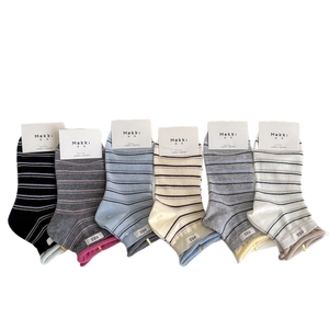 Set of six striped combed cotton mid-calf socks in various colors with egg logo labels
