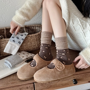 Brown suede Mary Jane slippers with warm brown animal pattern socks for autumn winter