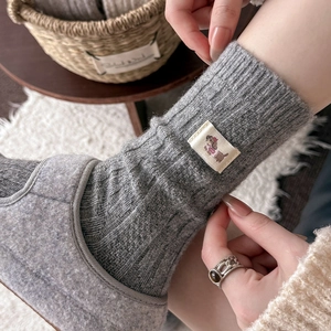 Winter thick wool socks for women featuring cute dog patch and vintage ribbed knit pattern