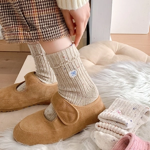 Winter wool socks with heart bow embroidery and colorful dots, worn with Mary Jane shoes