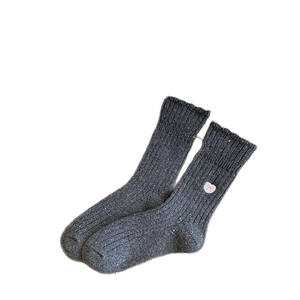Thick wool socks in dark grey knit with pink heart embroidery and bow detail