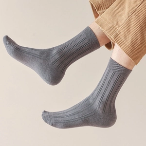 Detail of grey ribbed cotton blend crew socks with vertical texture for men