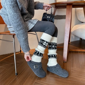 Winter knitted leg warmers with snowflake patterns and thick ribbing for women