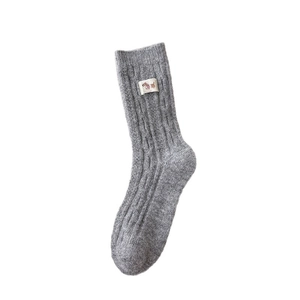 Winter thick wool crew socks for women in grey with cute dog patch and ribbed texture