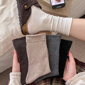 Five-pack of solid cotton crew socks for women in white, brown, beige, grey, and black colors