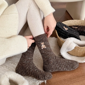 Thick warm dark brown knit socks featuring a cute cartoon bear embroidery detail