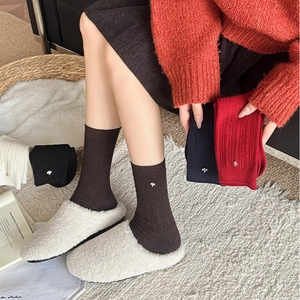 Winter wool blend rib-knit crew socks for women featuring a stylish metal dog accessory