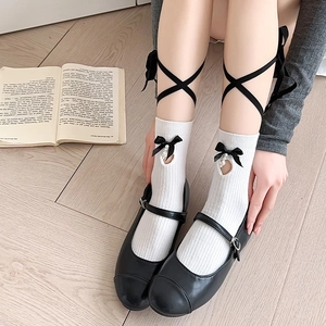 Japanese JK style white mid-calf socks with black bows and pearls and Mary Jane shoes