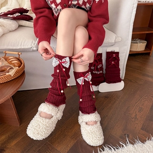 Burgundy knitted leg warmers with white lace bows and pearls for ballet style