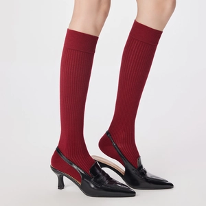 Deep red vertical ribbed wool long socks for women with warm knitting and slim fit