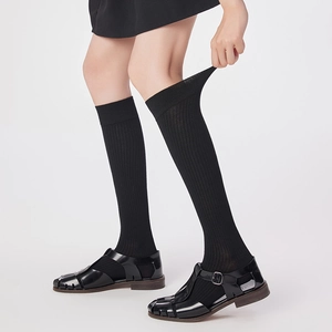 Black vertical striped wool knee socks featuring high elasticity and warm knitted texture