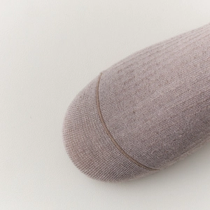 Detailed close-up of lavender wool calf socks showing reinforced toe and vertical ribbing