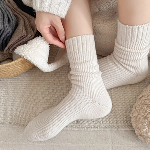 Cozy wool crew socks with vertical stripes in assorted warm earthy neutral colors