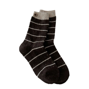 Vintage wool knit socks with brown stripes and decorative buttons on ivory ribbed cuffs