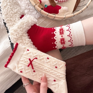 Winter wool thermal socks with festive snowflakes and red bowknot trim for women
