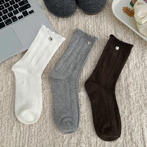Three-pack vintage French style knit mid-calf socks with ruffle trim and metal buckles