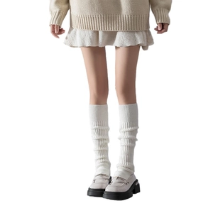 Japanese style white ribbed leg warmers for women paired with chic platform loafers