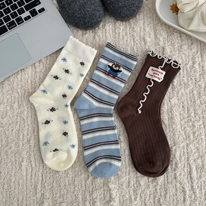 Three pairs of Korean style floral and striped mid-calf socks with cute embroidery detail
