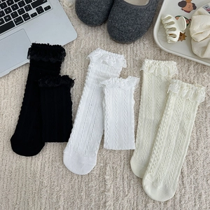 Sweet Lolita style lace trim crew socks in black and white with vintage cable knit patterns