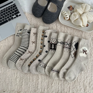 Cozy pack of 10 Fair Isle wool blend socks featuring cute dog and bow patterns for women