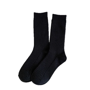 Thick black ribbed knit slouch socks for women made of warm cotton blend fabric