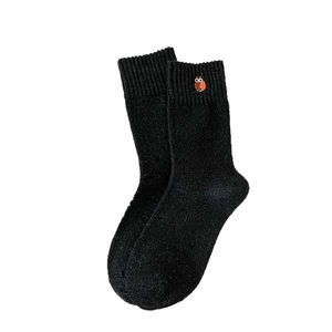 Japanese style cute black crew socks with brown owl embroidery on soft knit fabric