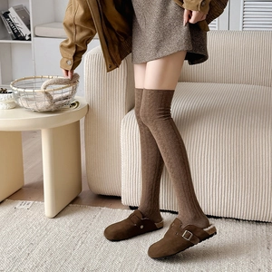 Brown cable knit over-the-knee socks with warm vertical texture for autumn winter style